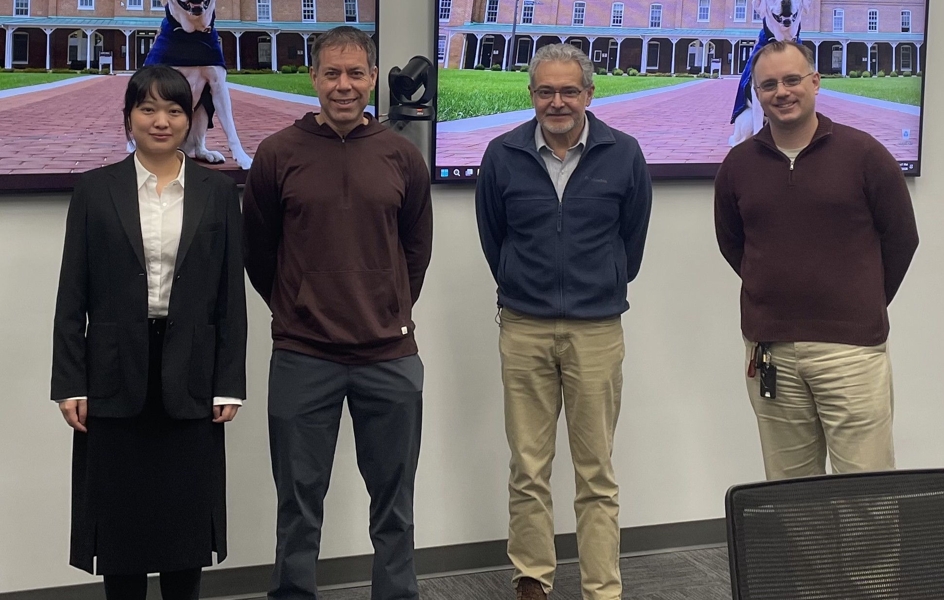 Photograph of Biqi and Professors